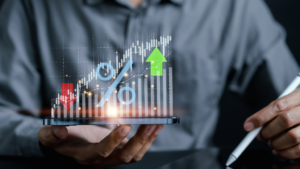 Businessman analyzing sales conversion rate on a smartphone, displaying a graph and bar chart for performance insights.