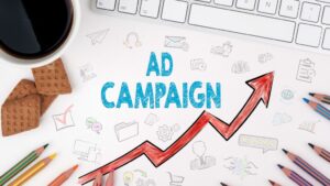 An image of a ad campaign drawing with a rising graph arround used in blog Google Ads vs Facebook Ads.
